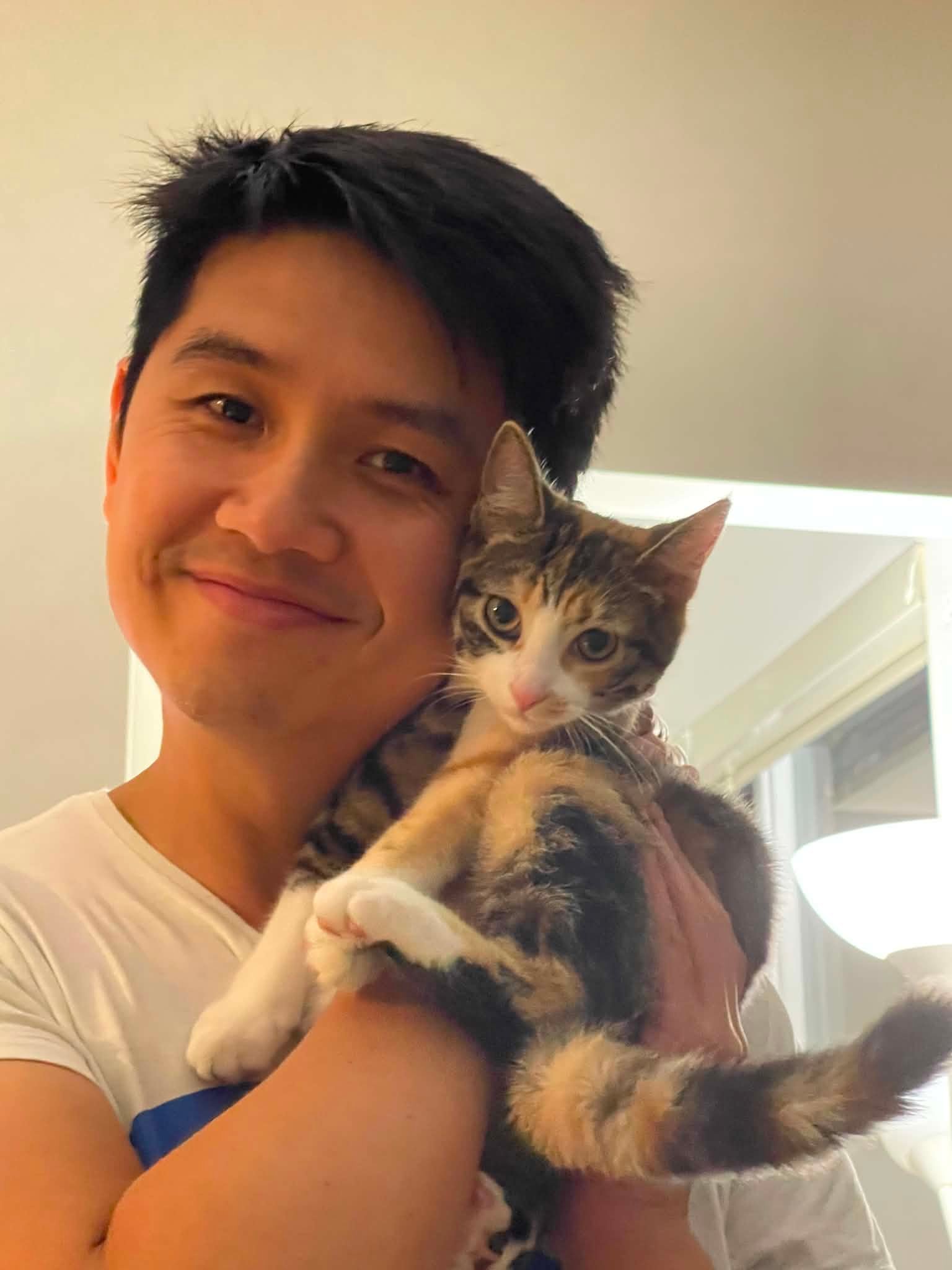 Vince at home with his cat